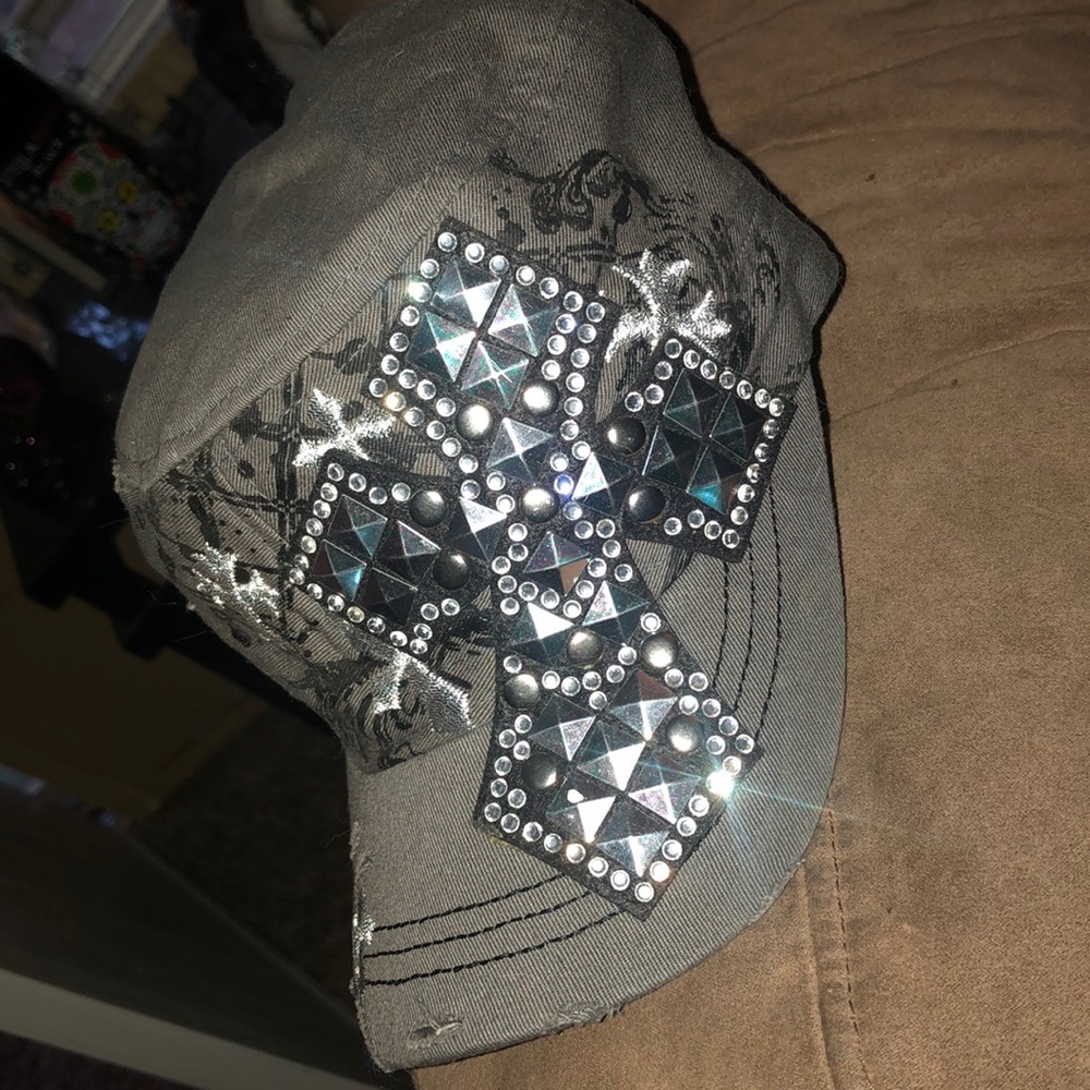 Adjustable Ladies Hat with Silver Cross on front.